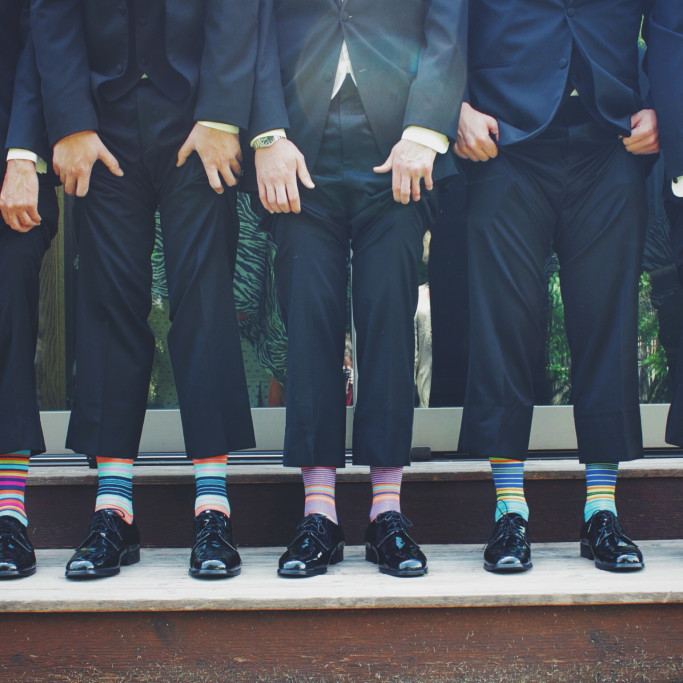 Group-of-Men Showing-Colorful-Socks-CC0